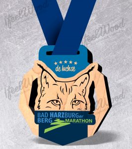 Medaille 2026 266x300